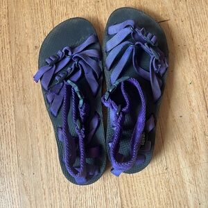 Black and purple teva sandals